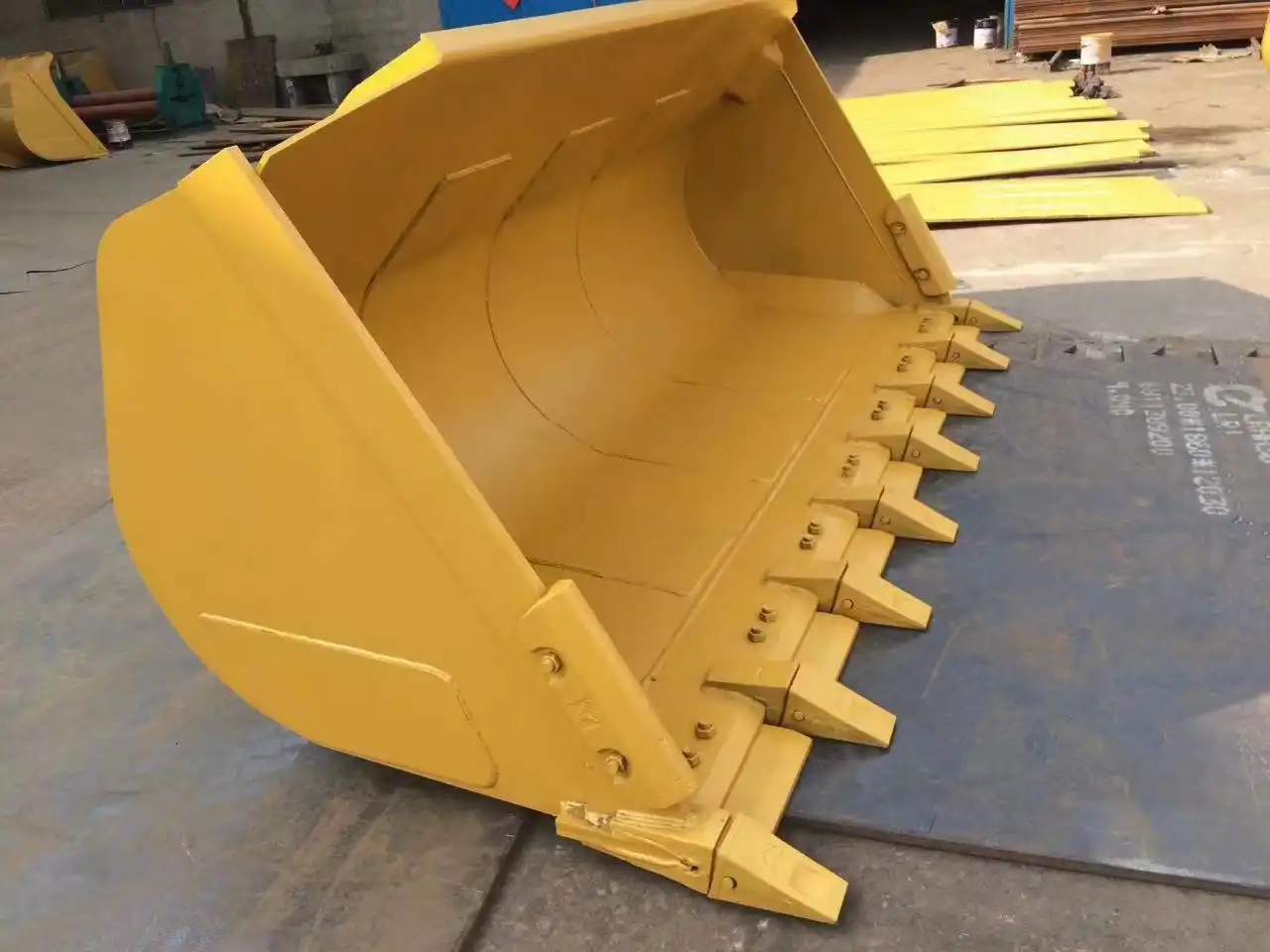 What size is a typical front-end loader bucket?